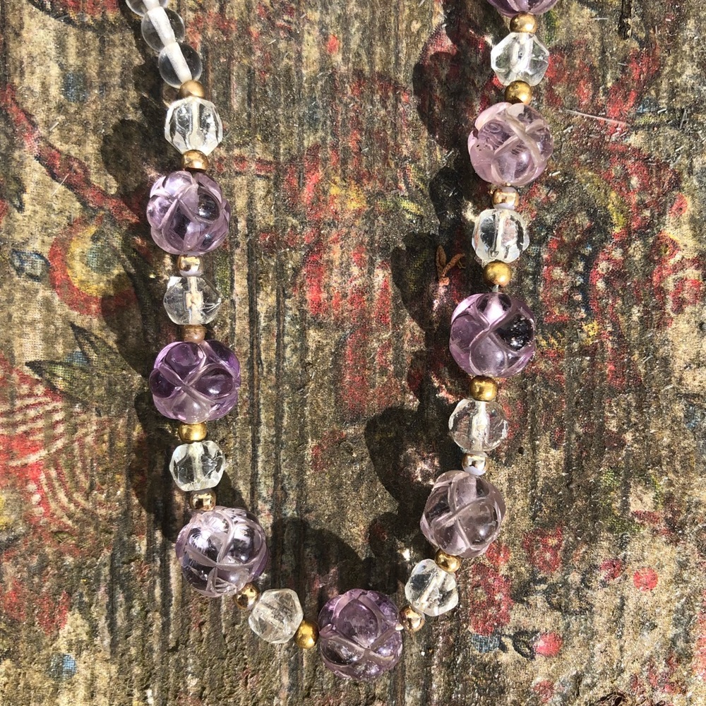 Amethyst beads with crystals.